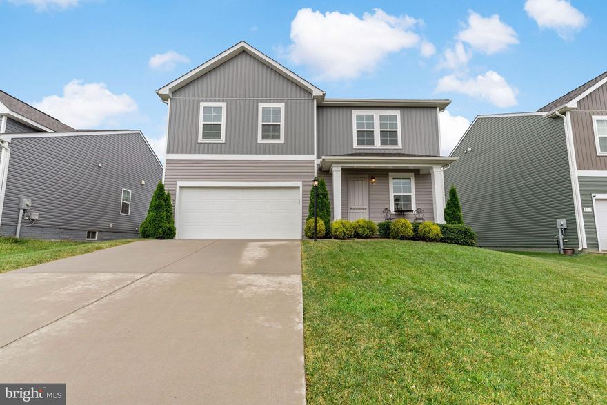 This thoughtfully designed home in The Overlook at Riverside blends comfort, style, and convenience in one exceptional package. The finished walkout basement with a private full bathroom offers space for a second living area, home office, recreation room, or guest suite.

Inside, the open-concept main level is filled with natural light and finished with luxury vinyl plank flooring. The kitchen stands out with quartz countertops, a large island, pantry, and generous cabinet storage—perfect for both daily cooking and entertaining. Appliances are upgraded beyond builder standard, adding performance and style, while a smart thermostat and an electric vehicle charging station in the two-car garage bring modern efficiency to everyday living.

Upstairs, the spacious owner’s suite provides abundant closet space, and secondary bedrooms easily accommodate larger furniture.

Located minutes from I-81 (Exit 23) and Riverside Marketplace for shopping and dining, the community also offers a dog park, sports courts, playgrounds, and a pavilion. Outdoor recreation is nearby with the C&O Canal towpath just a short drive away.

Schedule your showing today to see why this home is a standout in Berkeley County.