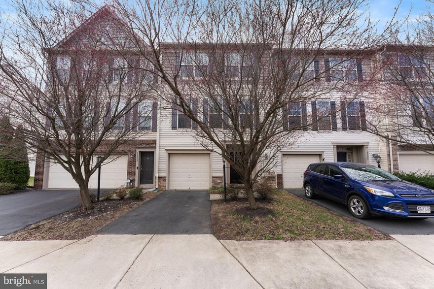 Beautifully maintained 1-car garage townhome in the heart of Broadlands with over 2,400 sq. ft. of finished living space. Located in a highly sought-after community with top-rated schools and just minutes to the new Ashburn Metro, shopping, dining, and major commuter routes. This light-filled home offers privacy and modern elegance throughout.

Features include hardwood flooring on all levels, an upgraded kitchen with stainless steel appliances, granite countertops, cherry cabinets, center island, pantry, and a bright breakfast area with access to a large party deck overlooking trees and open space. Spacious living room with separate dining area and cozy fireplace.

The upper level boasts a large primary suite with vaulted ceilings, a walk-in closet, and a beautifully updated bathroom with soaking tub and separate shower. Convenient upper-level laundry. The lower level features a huge rec room that walks out to a private, fenced-in backyard and patio—perfect for entertaining or relaxing.

Enjoy fantastic community amenities: tennis and basketball courts, picnic areas, walking trails, tot lots, and more! Ample visitor parking nearby.