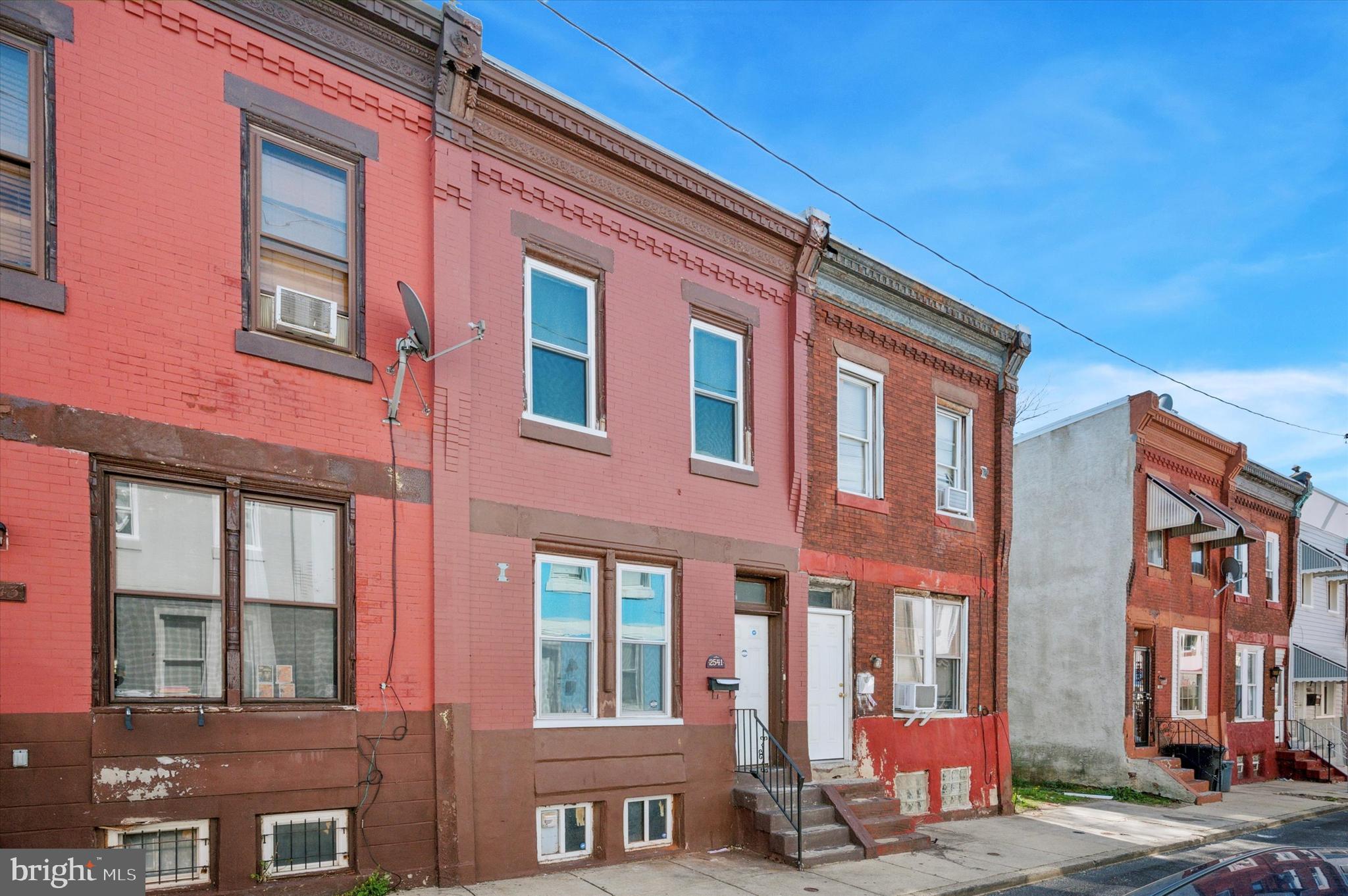 Check out this renovated rowhome that has received many valuable upgrades! Perfect for an investor or owner occupant, this home has a convenient location close to North Broad train station & Temple University. Throughout the home, you'll appreciate the clean white paint, and the contrasting stylish flooring. The beautiful kitchen was completely updated in 2020 to include white cabinetry with crown molding, tall storage pantry, granite countertops, and subway tile backsplash! Upstairs, you'll find 3 nicely sized bedrooms, and an updated bathroom with modern amenities. Additional updates include: Coated roof (2019), New windows (2020), and upgraded electrical & plumbing systems (2020)! Forced air ductwork is already in place, which means you can easily install central air if desired. In the upcoming warmer months, step out back to enjoy a private patio with new privacy fence installed! With some decorating touches, this could be a perfect gathering & BBQ space for friends & family. The basement houses the laundry area, and gives plenty of space for storage, to keep your living area clutter free.
Another great feature of this home is that every room has overhead lighting and many have ceiling fans...no more fumbling for lamps in the dark. All appliances are included: Washer, dryer, refrigerator, stove, dishwasher, and microwave. Make your appointment today!