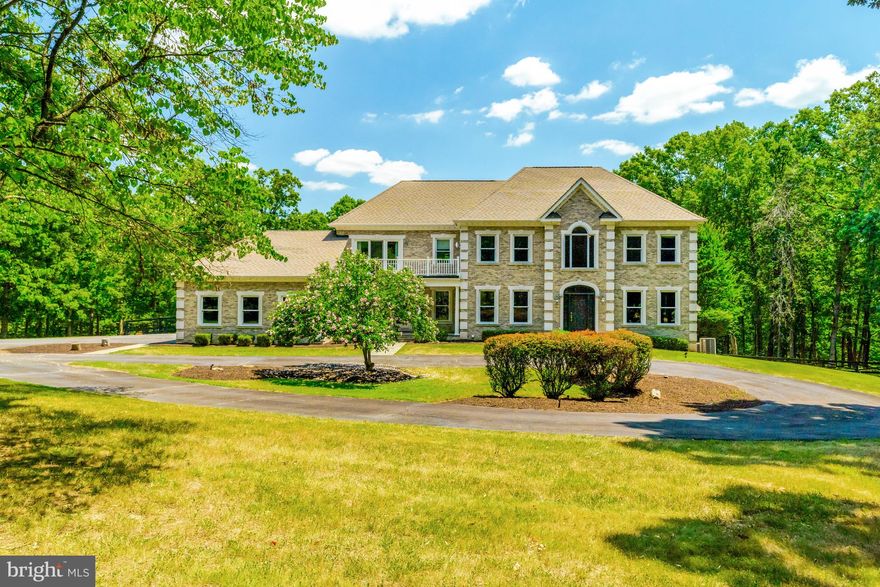 VA LOAN ASSUMPTION Veterans with Full VA Eligibility and Substitution can assume this VA Loan with an approximate $1,685,000.00 Remaining Balance and approximately 26 years remaining on this assumable VA loan at 2.75 percent. The Seller is willing to consider holding a second trust with a 10 percent down payment from a Qualified Veteran Buyer with Full VA Eligibility. Reyle & Company performed an independent appraisal of the property, and the appraised value came in at $2,700,000. It is also available for your review in Documents. This Home has over 41 Acres and is 1 of 9 Homes in Paeonian Springs with 40 acres or more. Built in 1999, more than 50 percent of Paeonian Springs Homes were built from 1990 to the present. In Paeonian Springs in 2024, 3 Homes with 20 acres or more respectfully sold for $2,750,000.00 (29 acres), $3,300,000.00 (31 acres), and $3,600,000.00 (50 acres). 2 of these 3 sales were in Beacon Hills, which is especially beautiful year-round with magnificent foliage and are equally impressive real estate investments. It appears that Very Large Acreage Homes in Paeonian Springs are ascendant. Beacon Hills Development with No Homeowners Association! WOW! Only 39 Paeonian Springs homes have 10 Acres or More, 36 of these 39 homes are in Beacon Hills. There are no others! Paeonian Springs's impressive sales prices referenced above demonstrate strong demand. Paeonian Springs has fewer than 300 homes. These homes' sales scarcity and solid demand are financially very appealing. This Property's Beacon Hills Location also offers the Best of Both Worlds: Nature's Unparalleled Beauty Year-Round and Simultaneously Proximity to Shopping Centers, Restaurants, Antiques, Shops, Delivery, etc., of Leesburg, One of Northern Virginia's Largest Cities. There is a Shooting Range, a Creek, 4 Wells, Wildlife, and an ATV access path to help you enjoy accessing all this towering treelined private estate. Mark Twain said, “Buy land; they're not making it anymore.” Paeonian Springs, VA, is a remarkable illustration of Twain’s tongue-in-cheek statement. In 2024, in Northern Virginia, homes built from 1980 to the present with more than 40 acres sold from $2,710,000.00 to $3,600,000.00. This data indicates that the demand for Large Acreage Estates near the Nation’s Capital is an excellent investment. This spectacular Three Level, All Brick Colonial, Custom-Built Home with a Beautiful Pool offers you Five Gorgeous Bedrooms and Five Full Bathrooms and Two Half Bathrooms on the most private tree-lined 41 Acres in Beacon Hill in Paeonian Springs, Virginia. Opportunities like this are rarely available. This Dream Home Boasts Over 4,800 Square Feet of Finished Living on the Upper Two Levels. Over 2,400 square feet on the lower level, with a fully finished walk-out Basement, Sauna, and plenty of sunshine streaming into the home throughout. The total Square Footage is approximately more than 7000 square feet of luxury waiting for you to call Home. This Impressive Luxurious home was Built in 1999 celebrating the twenty-first century in style. The upgrades are numerous, with over $100,000 in Eco-Friendly and High-End Upgrades from flooring to appliances, all listed in the Documents section entitled “Renovations and Upgrades Summary.” The home is palatial, so treat yourself now to the lavishness you love.