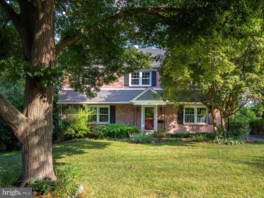 Nestled in the prestigious Merion Golf Manor neighborhood of Ardmore, this charming home is move-in ready. Recent updates include the renovated kitchen and baths, as well as a new roof, siding, and heater, ensuring years of worry-free living. As you enter, you’re greeted on your left by the cozy living room featuring a wood-burning fireplace and a picture window that bathes the room in natural light. The dining room boasts chair railings, crown molding, and another picture window, creating a perfect setting for family meals or entertaining guests. The heart of this home is the renovated eat-in kitchen, complete with white wood cabinets, granite countertops, and bar seating. The kitchen flows into the sunroom with vaulted ceilings and skylights, which opens to the family room with a brick gas fireplace. The main floor also includes a powder room, a convenient laundry room and access to the attached two-car garage with a loft for storage. Upstairs, the primary bedroom has been thoughtfully converted from two rooms into one, offering two closets and a renovated ensuite bathroom with a tub and separate shower. Three additional bedrooms share an updated hall bathroom with a shower. One of the bedrooms leads to a bonus room on the third floor, providing ample room for a home office, guest room, or additional living space. The finished lower level offers even more room for recreation, with a powder room and kitchenette area. Outside, the backyard and patio are perfect for outdoor gatherings or simply enjoying the peaceful surroundings. Located in the exceptional neighborhood of Merion Golf Manor, known for its strong community and terrific location. Convenient to major highways, train stations, Suburban Square, shops, restaurants, library, YMCA, Haverford College walking trails, parks, and golf courses.