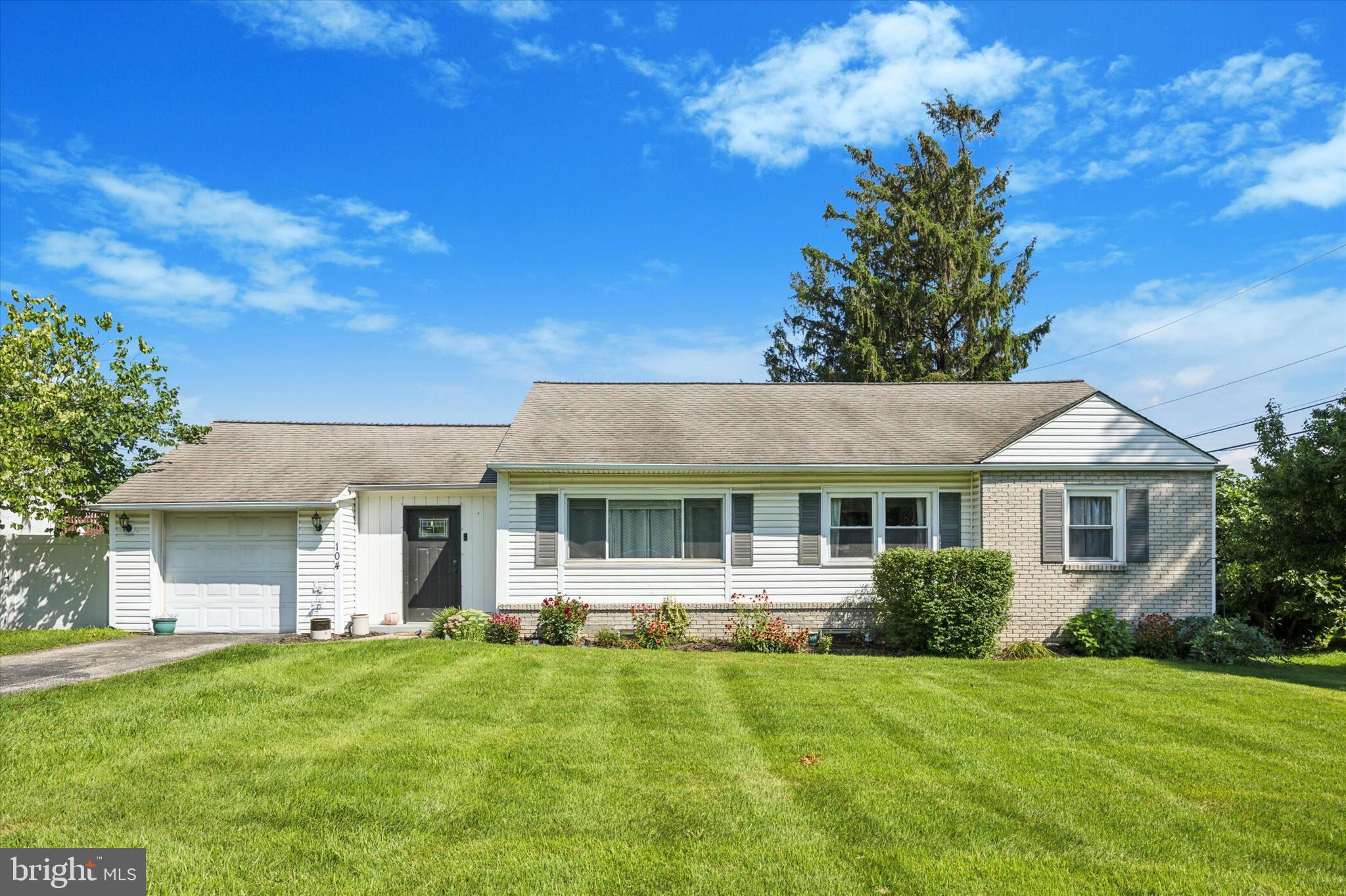 Your search is over! Check out this charming & tastefully updated ranch home, situated on a big piece of land in desirable King of Prussia. This 3 bedroom / 2 full bathroom home features an open layout, a fully finished basement, an attached garage, and a sprawling fenced backyard! Step inside to find a crisp modern farmhouse style, complete with neutral colors and warm wood accents that would compliment any style. The living room and dining area are open, and allow ample space for your comfortable furniture. The updated kitchen features white shaker cabinetry, open shelving, subway tile backsplash, stainless steel appliances, and a gorgeous butcher block countertop. The main floor is night and bright, thanks to the recessed lighting and many sunny windows. Down the hallway, you'll find 3 spacious bedrooms, and a renovated hall bathroom. The lovely bathroom boasts floor-to-ceiling tile, a black framed sliding shower door, and a new modern vanity. Still need more space? Head downstairs to the fully finished basement where you'll appreciate the wide open living space, including sliding barn doors and a custom bar area, and still enough space for a media room, playroom, workout room, etc. This level also includes a full bathroom that will transport you straight to a European spa, with soft colors & tile, a stand-alone soaking tub, and a separate shower. This finished basement space is very flexible and adds valuable square footage to the home. Step out back to fall in love with the peaceful backyard...flat and fully fenced with a white vinyl privacy fence all around. The children & pets will feel safe and secure, while having tons of space to roam. A gravel patio gives the perfect space to grill and chill; gather with friends & family from early spring, all the way into those crisp autumn nights with a cozy firepit. The attached garage leads to a big mudroom, the perfect drop zone for school supplies and groceries. All of this, located in the sought-after Upper Merion School District, with ultra-low taxes and convenient access to shopping, dining, and commuting. Schedule a private tour today and make this your dream home!