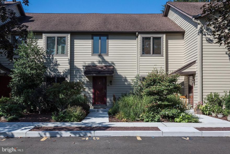 Gorgeous townhouse in Ingham Mews! Community offers pool and tennis. Spacious living room and dining area. Remodeled kitchen with hardwood floors, granite counters, tile back splash, stainless steel appliances, maple cabinetry with glass inserts and features a pass through to the family room. Butler's pantry complete with wine refrigerator and additional cabinetry. Family room with stone fireplace, recessed lighting, plantation shutters, crown molding and patio door opens to the deck. Second level with 2 large bedroom suites. Master bedroom with dressing area, wall of closets, remodeled bath with glass shower. Another large bedroom suite with remodeled bath. Finished lower level with separate office large area for entertaining. Located only steps from the pool, one car detached garage with storage. Freshly painted throughout, all carpeting steam cleaned, and in move-in condition.