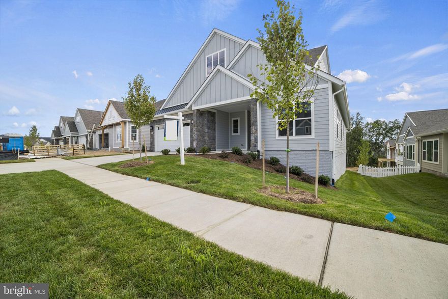 Welcome home to Trilogy at Lake Frederick, the area's premier 55+ community featuring amazing amenities including an expansive recreation facility with indoor and outdoor pools plus the Shenandoah Lodge with dining, drinks, a private lounge, and much more. 

This Evoke model situated on a premium homesite ($15,000 lot) offers 4 bedrooms, 4 bathrooms, a 2-car garage, main-level owner suite, finished walkout lower level, gas fireplace in great room, and so much more. Over $268,000 in upgrades throughout include Shea's signature layout with Kitchen Aid appliance package, hardwood floors on the main level, and more. 

Ask about Shea Mortgage's closing cost assistance up to $15,000. Discover your new home, a new adventure, and your new Active Adult community in Trilogy at Lake Frederick!