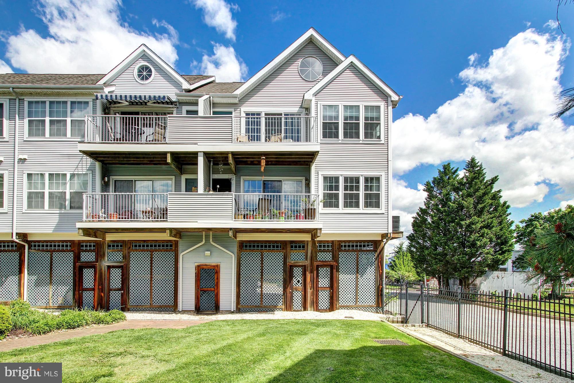 Enjoy life in Beautiful Downtown Havre De Grace in this Bright, Sunny, Spacious Top floor condo w/glass sliders to the rear deck that overlooks the Courtyard & Community Pool. Updated kitchen w/Breakfast bar, granitic counters & SS appliance. . Spiral staircase to loft are or 3rd bedroom. New washer & dryer. New HVAC . 2 car tandem garage has plenty of room for your water toys.