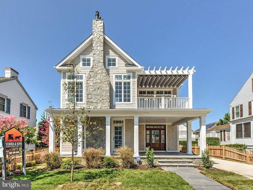 Enjoy beautiful ocean & Silver Lake views from this stunning new construction home in the ocean block of South Rehoboth. This home will not disappoint any buyer with unparalleled quality finishes and attention to detail. The stone floor front porch and gorgeous solid mahogany front door set the stage for the impressive interior that is flooded with natural light. This home boasts almost 3,200 SF of exquisite indoor and outdoor living spaces including 5 bedrooms, 4.5 marble tile baths, inverted open floor plan, elevator, vaulted ceilings, wide plank oak floors, two fireplaces and unfinished basement. The gourmet kitchen features floor to ceiling custom cabinetry, quartz counters, large island perfect for entertaining and Wolfe/Sub-Zero appliances. 1st and 2nd floor master suites and 5th bedroom easily utilized as an executive office or den provides versatility for any buyer. The ocean sunrises and Silver Lake sunsets from the ipe wood balcony covered by a beautiful pergola with retractable awning is a feature that only this location can offer. The list goes on and on and and it is one of the more special homes offered for sale in Rehoboth Beach.