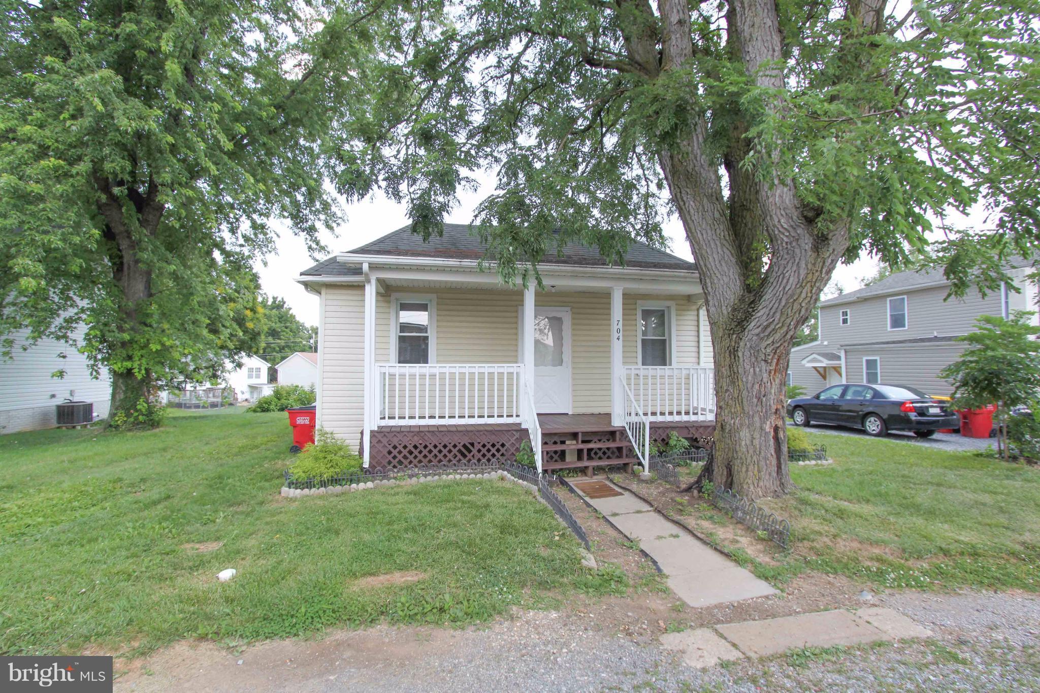 2 bedroom, 1 full bath cottage located within walking distance to The Hollywood Casino in Charles Town, Jefferson Medical Center, and American Public University. Less than 5 miles driving distance to major commuter routes 340 & 9. Features a front porch, granite counter tops in the kitchen, and built-in book shelves in the living room. Storage space in the cellar. Washer & dryer on the way.