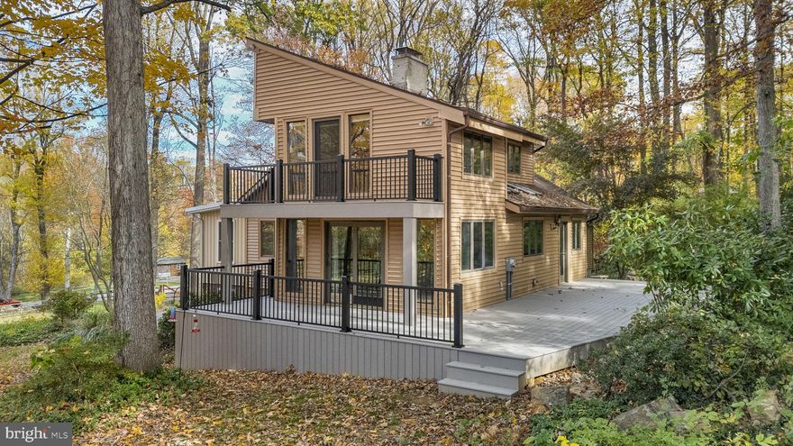 Charming Contemporary/Rustic Retreat in Picturesque Chester County 

Step into your ideal sanctuary! This 4-bedroom, 2-bath contemporary/rustic home is nestled on a beautiful 2.5-acre partially wooded lot, offering a tranquil retreat in the heart of  breathtaking Chester County.  With its unique character and inviting ambiance, this home is a must-see!

As you step through the foyer/expansive mudroom on the bottom level, you'll be greeted by a cozy area with a wood stove perfect for relaxing or entertaining.  As you climb the hardwood stairs to the 2nd floor, you'll see an open floor plan which seamlessly connects the spacious living area, kitchen, dining room, and a delightful sunroom/office--where an abundance of natural light floods in through the generously-sized windows.  The vaulted open beam ceiling adds an airy feel, while the beautiful surrounding hardwood and fireplace create a warm, inviting atmosphere, replicating the feeling of a log cabin home.  On this main floor are also 2 large bedrooms with a full bath.  The kitchen boasts a large pantry and unique brick border walls which enhances the overall charm.  The laundry is off to the side of the kitchen.

On the 3rd level, retreat to the master bedroom, your personal haven, with vaulted ceilings and natural light, plus a private slider door leading to your deck overlooking the expansive yard.  The updated
adjoining bathroom boasts dual sinks and a beautifully tiled shower, providing a touch of daily luxury.  The upper level also features an additional spacious bedroom, providing flexibility for guests or family.  The upstairs has a one-of-a kind architectural feature with wooden eaves that open to the main floor.

Enjoy the beauty of the outdoors from the newly redone decking, perfect for entertaining or simply savoring the peaceful surroundings. Additional highlights include a gated driveway, a tranquil koi pond, 2 sheds for storage, outdoor playground, a (smart-device) self-watering garden system, and ductless split units for efficient heating and cooling.  The property is clean, well-maintained, and ready for your personal touch.

New Deck 2025, New Flooring (lower level) 2025, New Flooring (main floor) 2023, 3rd Floor Bathroom Remodel 2020

Don't miss your chance to experience this unique gem!   This is more than just a house; it's a place where memories are waiting to be made.  Come and see why this enchanting property is the perfect place to call home!