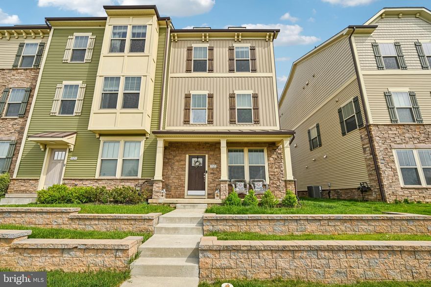 Stunning end-unit townhouse that is move-in ready and packed with unique upgrades including a rooftop terrace! 
The entry level features brand-new flooring and a versatile multi-use space—perfect for a home office, study, or guest area—along with a full bathroom for added convenience.
The second floor boasts a bright, open-concept layout filled with natural light from oversized windows. The chef’s kitchen is a showstopper, complete with double wall ovens, an oversized island with quartz countertops, and ample space for entertaining. The living room features a cozy fireplace, while the dining area includes a built-in bar with a wine fridge. Step outside onto the spacious deck, ideal for relaxing or hosting. A convenient half bath completes this level.
On the third floor, the luxurious owner’s suite offers a private balcony, a walk-in closet, and a spa-like bathroom with a dual-head shower. Two additional bedrooms and a full bathroom provide plenty of space for family or guests. A washer and dryer on this level makes laundry a breeze. 
The top floor serves as an additional private retreat, featuring a second primary suite with a walk-in closet, full bathroom, and access to a private rooftop terrace—perfect for enjoying outdoor living at its finest.
This home offers abundant street parking in addition to a spacious attached two-car garage.
You can't beat the location, close to commuter routes, shopping, and dining.
The Villages of Urbana is not just your standard HOA, it's a way of life. Complete with pools, pickleball courts, fitness center, Baseball Field, Basketball Courts, Bike Trail, Club House, Community Center, Exercise Room, Jog/Walk Path, Library, Recreational Center, Soccer Field, Tennis Courts, Tot Lots/Playground. Located at 3630 Stone Barn Drive.