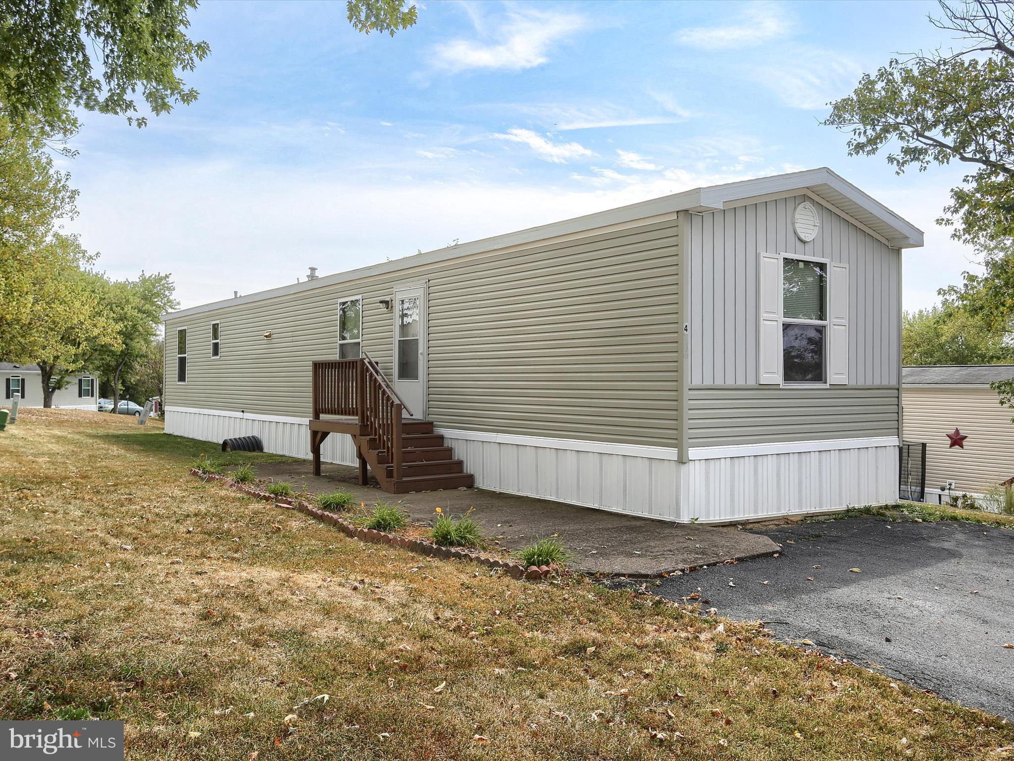 Charming two-bedroom, two-bath manufactured home in Carlisle, built in 2012. This approximately 924-square-foot home features an open layout with a bright living room flowing into the kitchen and dining area. Each bedroom has its own full bath, offering privacy and convenience. Modern comforts include forced-air heating and central air. With low taxes and affordable upkeep, this home is ideal for first-time buyers or downsizers. Conveniently located just minutes from shopping, dining, and commuter routes.