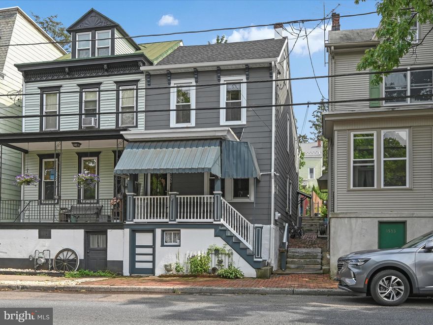 Here it is!  Affordable and Adorable attched Single conveniently located and ready for your move!  Pride of ownership is evident throughout.  Remodeled Front Porch, privacy fenced back yard, new floor coverning;   New roofs (shingle & rubber), new gutters with heat tape 2021, furnace cleaned and serviced July 2023 - just a few of the upgrades and improvements completed by current owners. Livning room & dining room blend seamlessly for easy entertaining. The little gas fireplace/stove remains for additional warmth. The corner hutch, chair rail and open staircase add appeal.  The eat-in Kitchen is framed by 26 handles and plenty of counter space.  The appliances remain to make your move easy.  The main floor laundry adds convenience and appeal!  The primary bedroom offers a new laminate floor installed July 2023.  Two additional bedrooms and a full bath  complete the second floor.  The walk up attic is floored for storage and could be finished for a fourth bedroom. Storage shed for tools and supplies.  Plenty of outdoor fun - covered patio with swing, above ground pool, deck, and fire pit.  Make memories and enjoy the benefits of home ownership!