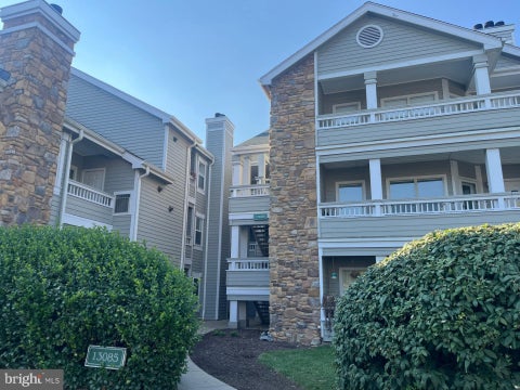Photo of 13085 Autumn Woods Way #204, FAIRFAX, VA 22033 (MLS # VAFX2348022)