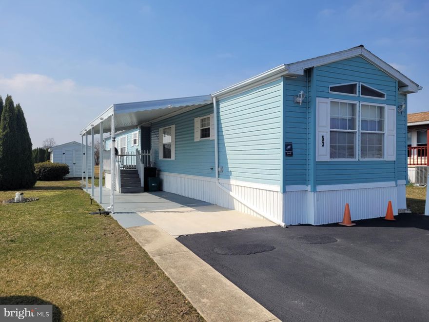 Welcome Home! This beautifully maintained home in Country Acres Gold Park is priced to sell. Featuring two bedrooms and 2 full bathrooms, spacious kitchen and living room. Covered carport plus driveway space. Porch is also covered. Schedule your showing today! Buyer must be park approved. Please make sure to read to rules and regulations prior to submitting an offer. This is a 55+ community. Monthly lot rent is $385. Home is being sold as is.