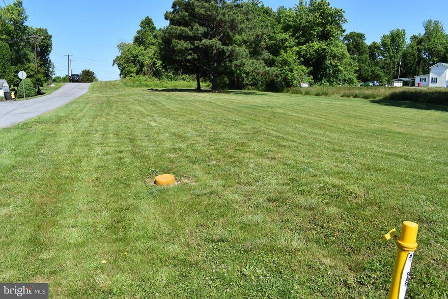 Very nice lot in  great commuter location just a minute from Route 9.   Lot has WELL and SEPTIC in place.  Seller does not know condition of either and has never occupied the property, but both are there and of record.  This is also one of the few locations in Jefferson County where Natural Gas is available to hook up for a new home.  There is an old cemetery at the front corner that has been split off the property and deeded to the church.  The lot measurements are assumed to be accurate, but could vary a small bit.  The sellers will remove the double wide with an acceptable offer.  This is a GREAT building lot and should not have any impact fees since there is an existing home in place.  No Covenants or Restrictions!