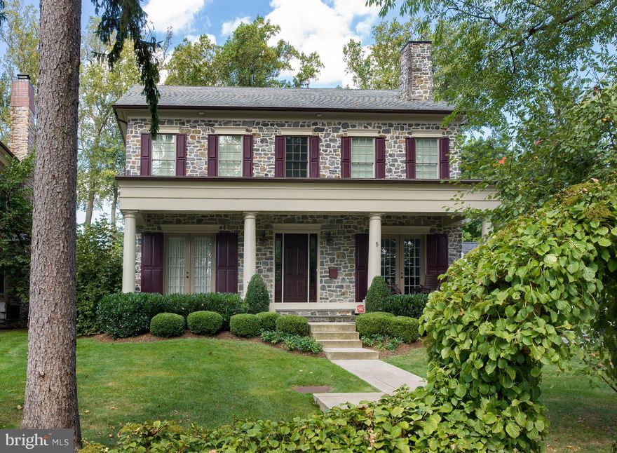 Exceptionally charming & beautiful custom-built house in the coveted, convenient, walkable neighborhood of Narberth, PA! This craftsman-style jewel is anything but cookie-cutter & will make you fall in love the moment you see it with its pristinely-landscaped property, gorgeous stonework, lovely shutters & elegant columned covered front porch. Built with care in 2011 & meticulously maintained, here is a family dream home melding quality construction & the classic architectural integrity of the area with a modern floorplan & amenities.Enter into a gracious foyer with gleaming oak wood flooring, airy ceilings, tasteful millwork & moldings, designer lighting, and a stunning neutral color palette enriching the ambiance throughout. Tall light-filled windows brighten every room, met by fine finishes and attention to detail at every turn. Open to the foyer is a spacious formal dining room with glass doors to the covered porch for enjoying after-dinner coffee on warm evenings. Another set of French doors lead to an intimate den or office, perfect for sipping cocktails and conversing with guests before or after dinner. Entertain and host special occasions in the generously-sized great room/family room with recessed lighting and a gas fireplace to gather around. Adjacent sits the open gourmet kitchen affording a seamless flow, appointed with high-end cabinetry, granite countertops, a center island, long counter bar with seating, dual sinks, and stainless steel appliances including a 6-burner stove, double oven & microwave. A butler s pantry and sunny breakfast room round out the chef s quarters and the heart of the home. Also on this level is a guest powder room, laundry room, porch/sunroom with TV & access to the 2-car attached garage.Upstairs the enormous master suite beckons featuring tray ceilings, a sitting area with gas fireplace, huge custom walk-in closet, and luxurious his & her bath with connecting oversized shower. A guest suite, 2 more bedrooms, hall bath with double sinks & a reading/study nook complete the upper level. On floor 3, a finished bonus room offers versatility as an exercise/multipurpose space. If that weren t enough, the fabulous lower level presents high ceilings, polished concrete floors, a living/game area, distressed wood bar with a granite/leather finish, brick wall & columns + a spa-quality full bath. Extensive closets, built-ins & storage, a fire suppression system & whole-house generator heighten the appeal of this unique, timeless, low-maintenance gem.The location is superb, walkable to shops, playgrounds & the train, close to Suburban Square & grocery stores, within a 5-minute drive to almost anything else you might need!