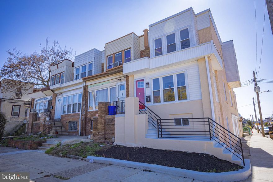 Welcome to 1534 S 56th Street, a beautifully renovated gem in Southwest Philadelphia! This charming home boasts  over 1400 square feet (1st & 2nd floors) New, New, New from top to bottom. The main floor offers a bright and roomy enclosed front porch with a large coat closet, through the glass entry doors lends to a huge open floor plan! Conveniently located powder room, custom railings, ample of recessed lights, ceiling fans, and TONS of natural light! This new kitchen is ready for you to bring your culinary skills - granite counters, island, decorative lighting, tons of counter space, tile backsplash and stainless appliances. Off the rear of the kitchen you will find a new deck ready for relaxing and summer BBQs with stairs leading to a fenced in private yard.  The second floors features 3 great sized bedrooms, good closet space and a beautiful full bath with custom tile and a double sink.  We aren't done yet as there is a HUGE fully finished walkout basement (estimated 700 sq ft) with a 4th bedroom, ANOTHER full bathroom, and laundry room. The home features contemporary finishes throughout, creating a modern and inviting atmosphere, new windows, new HVAC, new heater, Central Air, new floors and the list goes on and on! This property offers a perfect blend of style and functionality. Don't miss your chance to call this stunning residence your new home!