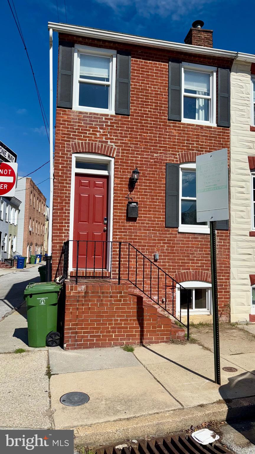 Location! Location! Location! Welcome to this GEM located in the Riverside Historic District nestled between Federal Hill and Locust Point in Baltimore City! An end of group townhome featuring two bedrooms, and a third bedroom/rec room in the basement, exposed brick, gleaming hardwood floors, a renovated kitchen with stainless steel appliances, unique lighting, cabinetry, and a breakfast bar, updated bathrooms, rear deck with walk-down that can be repurposed to create off street parking, and so much more! Perfect for homebuyers or investors looking for a turnkey property in a highly desirable location.