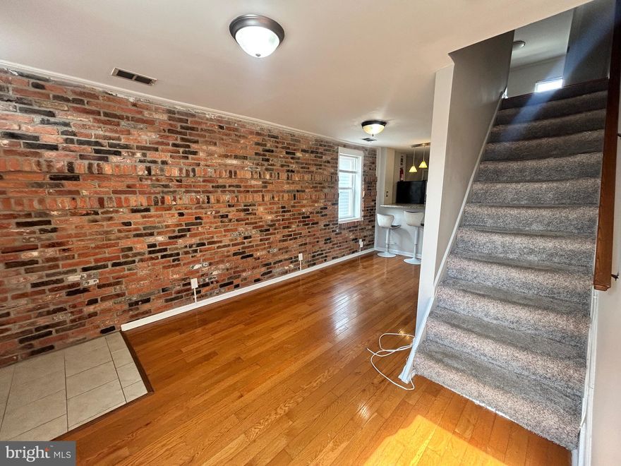 Location! Location! Location! Welcome to this GEM located in the Riverside Historic District nestled between Federal Hill and Locust Point in Baltimore City! An end of group townhome featuring two bedrooms, and a third bedroom/rec room in the basement, exposed brick, gleaming hardwood floors, a renovated kitchen with stainless steel appliances, unique lighting, cabinetry, and a breakfast bar, updated bathrooms, rear deck with walk-down that can be repurposed to create off street parking, and so much more! Perfect for homebuyers or investors looking for a turnkey property in a highly desirable location. THIS HOME IS ALSO AVAILABLE FOR RENT IN THE AMOUNT OF $1950.00 PER MONTH!!!