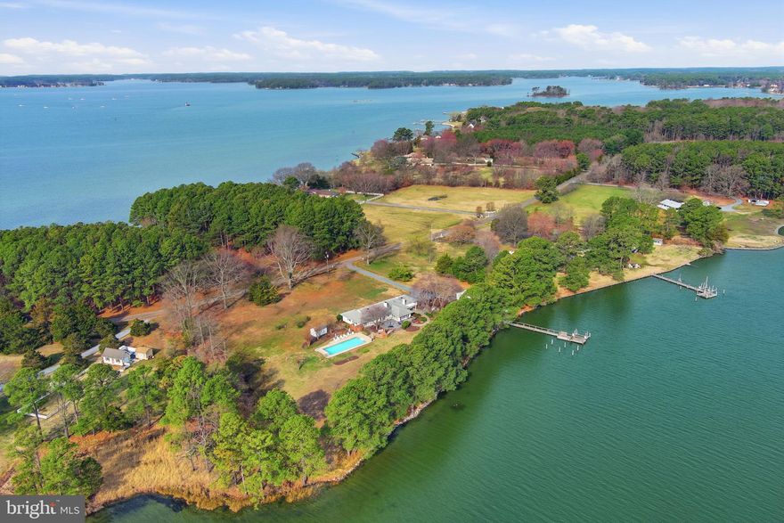 ST MICHAELS TUCKED AWAY ON DESIRABLE DRUM  POINT NEIGHBORHOOD, MINUTES FROM THE BUZZLING TOWN OF ST MICHAELS AND ITS MANY RESTAURANTS, SHOPS , CAFES, THE MOTOR MUSEUM AND THE CHESAPEAKE BAY MARITIME MUSEUM.  WHERE EVER YOU TURN YOU SEE WATER, FEEL THE BREEZES , LOUNGE BY THE POOL OR NAP IN YOUR HAMMOCK UNDER THE SHADY TREES BY THE SHORELINE. 
THIS THREE BEDROOM SOLID BRICK HOME WITH OPEN FLOORPLAN  , DOUBLE SIDED FIREPLACE , WOOD FLOORS , RENOVATED BATHROOMS AND KITCHEN - IS ALL ABOUT EASY LIVING AND TAKING ADVANTAGE OF THE OUTDOORS. CHARMING PATIO WITH STONE WALLS , DECK WITH OUTDOOR KITCHEN, HOT TUB ,  STEPPING DOWN TO THE OUTDOOR SHOWER AND SWIMMING LAPS IN THE POOL. THE DOCK OFFERS 3 MLW, A BOATLIFT AND  BOAT LAUNCH .
THERE IS A 2 ROOM STUDIO WITH COVERED PORCH TO ENJOY THE WATER VIEWS.
ENCAPSULATED CRAWLSPACE AND MANY UPGRADES.
EASTERN SHORE LIVING AT ITS BEST.