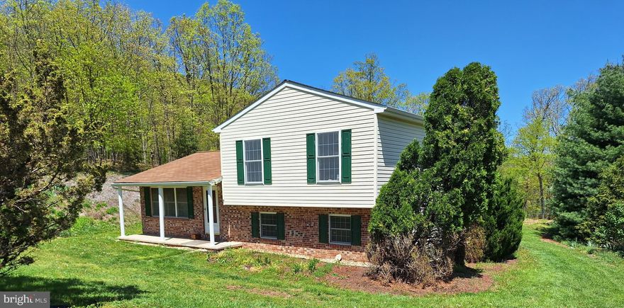 Welcome to your dream retreat nestled in a serene rural setting! This charming split-level home, built in 2000, offers a perfect blend of comfort and tranquility. With 1,672 square feet of thoughtfully designed living space, this residence features three  bedrooms , making it an ideal haven for relaxation and entertaining. Step outside to discover the expansive 0.83-acre lot, which includes an additional 0.739 acre parcel bringing the total to approximately 1.5 Acres!  Providing ample space for outdoor activities, gardening, or simply enjoying the beauty of nature. Peach & Cherry trees along with some gardening delights are already here for your enjoyment. The property boasts a stunning mountain view that creates a picturesque backdrop for your daily life. Imagine sipping your morning coffee on the inviting deck, soaking in the peaceful surroundings and fresh air. The property is in very good condition, ready for you to move in and make it your own.  This home offers a perfect escape from the hustle and bustle of city life while still being within reach of essential amenities. Whether you’re looking for a weekend getaway or a permanent residence, this property is a rare find that combines comfort & space. Don’t miss the opportunity to make this inviting home your own!