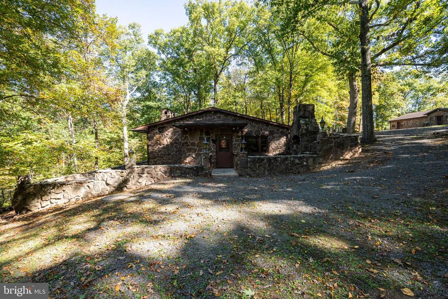 Stone Oak | Unique opportunity to purchase a private, retreat-like and 30+ acre property ideally located off Catharpin Road.  Offering includes a stone 3-bedroom dwelling, office/studio/gallery building with a kitchenette and his/her bathrooms, barn/workshop, and an additional tenant house.  Conservation easement in place, which allows for expansion of the single-family dwelling up to 4,500 sq ft of ground area and tenant house of 1,675 sq ft of ground area.  Large scenic pond with Lick Branch, a charming stream meandering through the property.  Two parcels included in the sale and cannot be sold separately.  Endless opportunities to create your own serenity, yet conveniently located less than 30 minutes to Dulles Airport and 45 minutes to Washington DC.