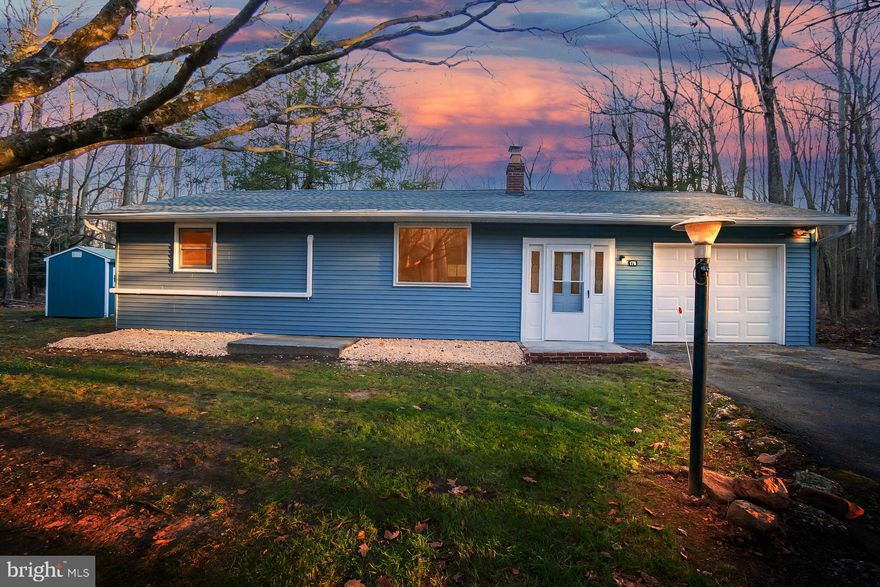 This beautifully renovated 3-bedroom, 1-bath ranch home, located in the exclusive gated community of Holiday Pocono, offers a perfect blend of modern updates and peaceful living. The home sits on a flat, spacious lot with a large backyard, ideal for outdoor activities, and features a deck overlooking the serene surroundings. The property also includes a convenient shed for extra storage and a 1-car attached garage. Inside, you'll find a bright and inviting living room with a cozy fireplace, which flows seamlessly into the updated kitchen. The kitchen boasts sleek granite countertops and stainless steel appliances, making it both stylish and functional. The main floor also includes a laundry area for added convenience, while the large family room provides ample space for relaxation or entertaining, with sliding doors leading directly to the deck. Throughout the home, new Mini Split units provide efficient heating and cooling, ensuring comfort in all seasons. With its fantastic updates, private location, and tranquil surroundings, this home offers an exceptional opportunity for those seeking a peaceful, modern lifestyle in a gated community.