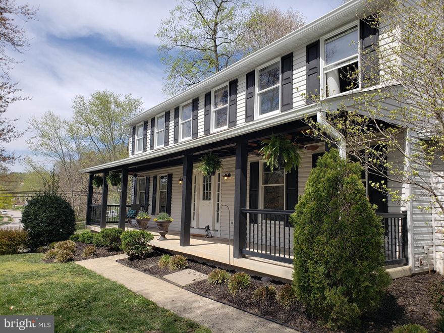 NEW TO MARKET!Stunning colonial located in highly sought after school district, featuring a large front porch, hardwoods on main, fully finished walk out basement with a kitchenette and full bath, new carpet and paint through out. Open houses 4/13&14 1-3pm More photos will be uploaded today.