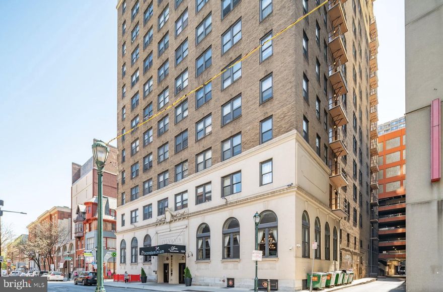 Own a stylish studio in the vibrant core of Center City. This corner unit features high ceilings, abundant natural light from four large windows, central air, laminate flooring, and a well-equipped kitchenette with a microwave, two-burner cooktop, and mini-fridge. The tiled bathroom includes a full tub and modern finishes.

Located in a pet-friendly, 16-story building, residents enjoy secured entry, wheelchair accessibility, and a welcoming 24-hour front desk. Amenities include a fitness center, business lounge, community room, on-site laundry with app-based payment, and optional bike storage.

Home to the beautifully restored Arts Ballroom and a convenient on-site barbershop, the building offers unique charm and convenience. Situated steps from Midtown Village and the Avenue of the Arts, you're minutes from top restaurants, cultural landmarks, Jefferson and Drexel Med, and premier shopping. Excellent public transportation access and nearby parking make this an unbeatable Center City location.