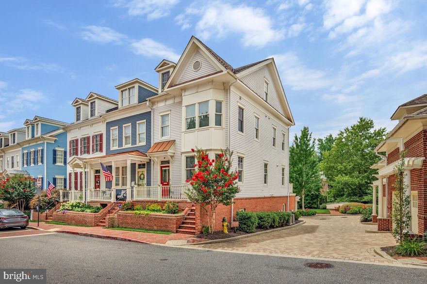 This stunning home in the coveted community of Acton’s Landing, combines all the amenities of modern living with the beauty, charm and architecture of historic Annapolis.  A short stroll to Main Street lets you explore the restaurants,  galleries, cafes, shops, and historic sights before returning to what feels like your own private oasis! This rarely available end-unit townhome was the original builder’s model for Acton’s Landing, executed utilizing finishes of craftsman-level quality. Upon entering the main level, you're welcomed by  9-foot ceilings, elegant crown molding, freshly painted walls in a soothing neutral palette all bathed in an abundance of natural light. Gleaming hardwood floors flow seamlessly throughout three levels of the home. The stunning gourmet Kitchen was thoughtfully designed incorporating a spacious island, custom warm-toned cabinetry, and top of the line stainless steel appliances, sure to delight your inner gourmet.   The eat-in kitchen opens to a sun filled deck overlooking a beautifully landscaped and serene Common.  The elegantly designed floor plan offers both flexibility and the ideal setting for effortless entertaining. The hardwood staircase to the third level leads to the Primary Suite with his/her custom closets and a stunning spa-inspired Bath featuring a walk-in shower, soaking tub and gracious double-bowl vanity   A large sunny, second bedroom with its own private ensuite bath and conveniently located laundry closet complete this level. The top floor offers the perfect private hideaway for your visiting Midshipman or guests, with vaulted ceilings, french doors, a full bath, and versatile space for an office, workout area, or media lounge. Step out onto the upper deck and enjoy peekaboo views of Spa Creek. The finished lower level adds a fourth bedroom or recreation room with a full bath and direct access to the two-car garage opening to a paver drive and tranquil common space beyond. Enjoy the benefits of recent upgrades, including two new HVAC systems, a new hot water heater, newly installed hardwood flooring on the bedroom and loft levels as well as the staircase, and a fresh coat of neutral paint throughout the interior. Just steps from the waterfront park at Acton Cove—perfect for kayaking or relaxing by the water—this rare offering in one of Annapolis’s most desirable communities combines low-maintenance luxury with unbeatable location. Welcome home, your lock-and-leave lifestyle at Acton’s Landing awaits!