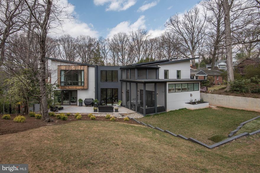 Open Sat. 1-4pm.Luxury Modern home built by Sagatov Design+Build w/designer finishes and high end details. Open main level includes a double kitchen island w/waterfall carerra marble counter tops, vaulted screened in porch off familyroom/kitchen, lounge with drybar & main level BedRm/office w/full BA. Stunning owner's suite w/floor to ceiling windows & gas FP, luxury baths,  in-law suite!