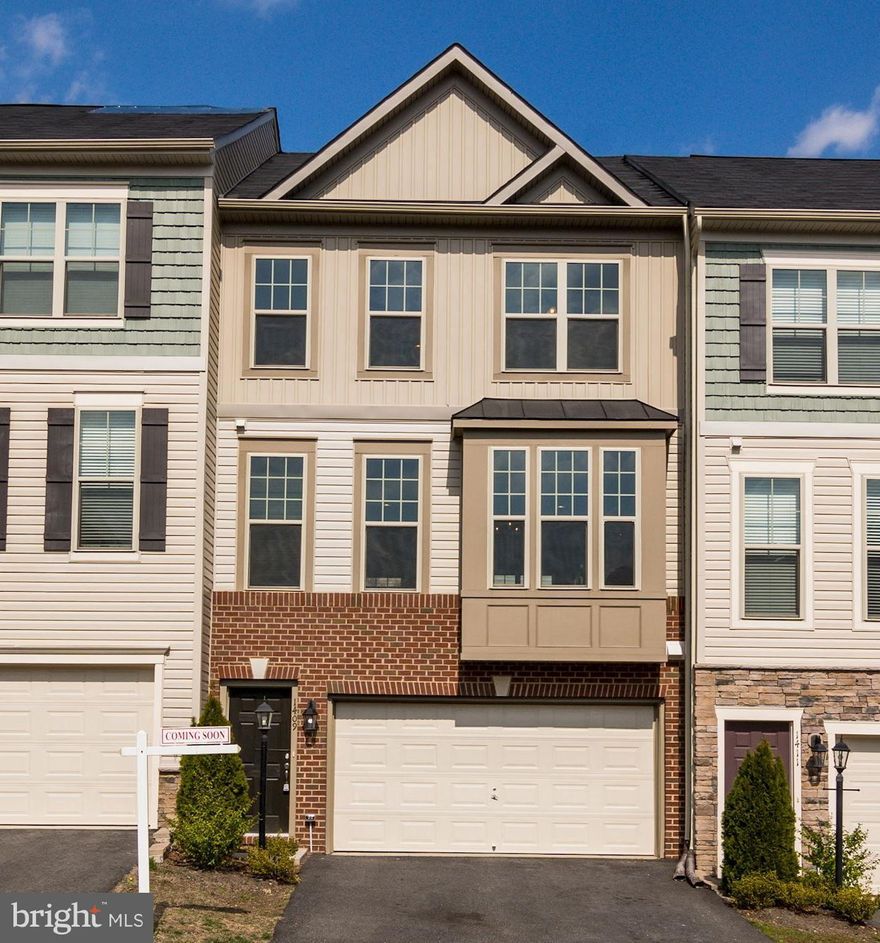 Location is steps to Old Town Occoquan, & a couple stop lights from 95/HOV commuter lot. Entry lvl inclds a spacious 2 car garage, walk-out basement with full BR & BA for guests and/or in-laws! Main lvl is built for entertaining with showcase kitchen incld almost 15 foot long island, bright open floor plan with living room/dining on either side. 3 BR upstairs, tray ceiling in MBR, laundry upstairs