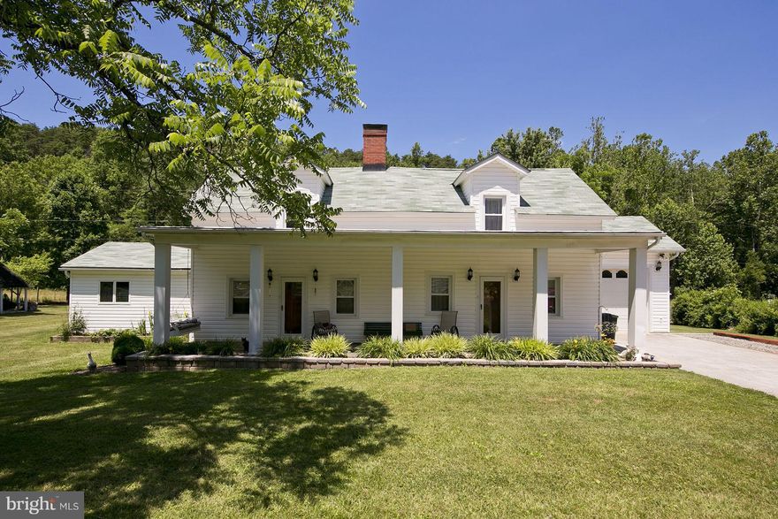 Beautiful country estate (over 4,000 sq. home with guest cottage on property). Completely remodeled and updated .Riding/hicking trails through out 50 acres. Bring your horses and your family , room for everyone! Two fenced 10 acre fields with Lohman's Run creek ,throughout. Property located on paved state maintained road. Abundant wild life,peaceful country setting yet only 20 miles to Winchester.