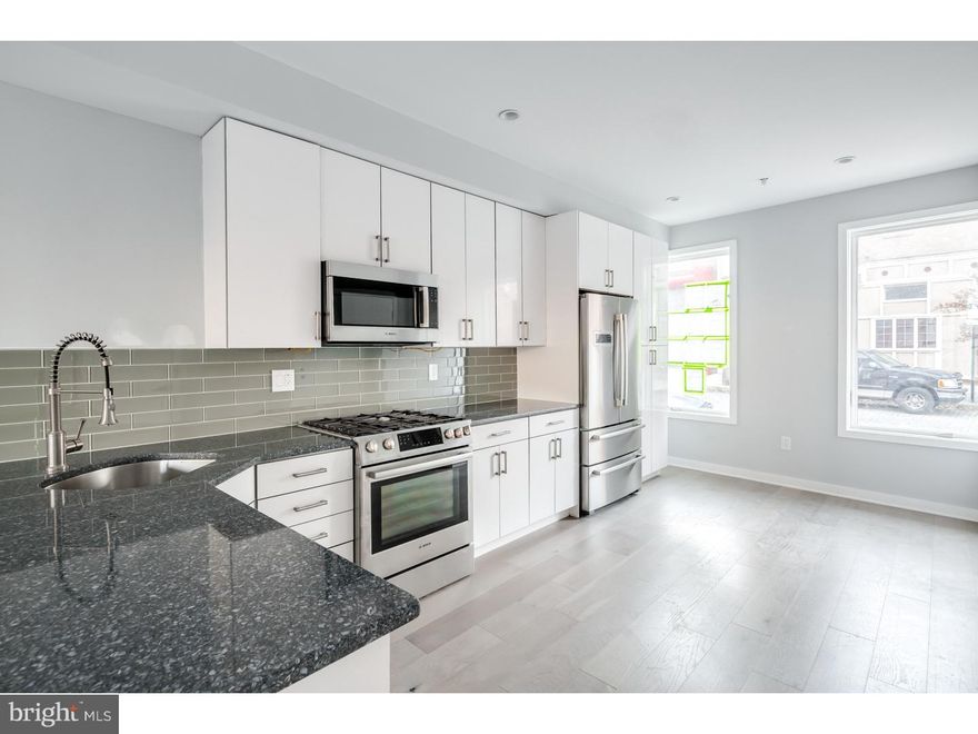 Waterfront living in the city!! Spectacular new construction condominium building in Old City with 10-year tax abatement, roof decks, LUX finishes throughout and the best roof deck views in the city!! The waterfront and bridge views are jaw-droppers while the city skyline view is unobstructed and these units get both views! Wake up and gaze at boats docked in the lovely Marina. More features include amazing kitchens with Bosch appliances, granite counters and tiled backsplashes, wide plank hardwood floors throughout, iron railing systems and extra-large windows and sliding doors leading to decks overlooking the water. The tiled baths are luxurious with beautiful tile work and designer fixtures. Different layouts in each unit create unique living spaces for every type of buyer! Super lox taxes. Unit "A" in 343 and 345 N. Front street is a bi-level unit with large living room, tall ceiling heights and spacious bedrooms. Located in Old City, just off of the beautiful waterfront. Walk to all of the historic sights, the waterfront, Nolibs and the Marina, Race Street pier, and much more. "Ask about the 1% down mortgage available for this listing"