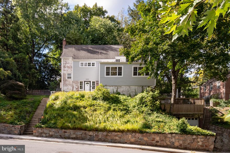 This 1950 brick single-family home sits gracefully on a hill in the desirable Donaldson Run neighborhood of Arlington. Enjoy morning strolls with the pups along the tree lined streets and the privacy of the tree top views from your deck. The location offers easy access to hiking trails, parks, schools, shopping and dining, all nestled into this cozy community. 
Inside, you’ll find beautiful hardwood floors, classic architectural details, and two wood-burning fireplaces that highlight the home’s charm. With over 2,400 square feet of finished living space, this residence includes 3 bedrooms, 2.5 baths, and a versatile layout.
The bright kitchen with gas cooking opens to a spacious deck overlooking the fenced backyard. Underneath, you’ll find extensive outdoor storage. A fully finished walkout basement with a wet bar, bonus room, and full bath provides flexible space for recreation, work, or guests.
This home also offers a detached one-car garage, a fenced yard, and abundant natural light in every room, plus membership access to the Donaldson Run Pool for endless summer fun!
