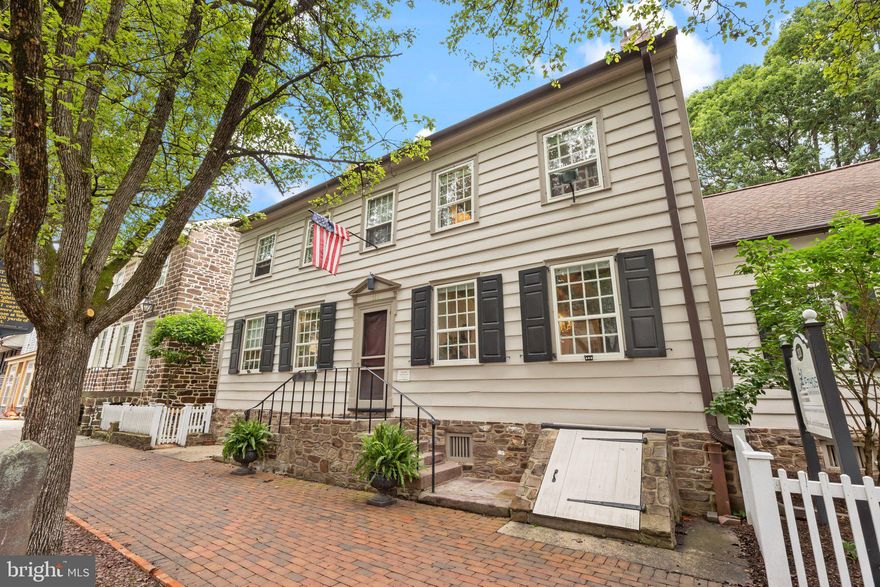 The Historic "Bird in Hand" building in the center of downtown Newtown Borough - across the street from Starbucks and the Newtown Hardware House; Built in 1686, it boasts a richly documented history and has been impeccably preserved with 7 fireplaces,  detailed millwork, random width wood floors, and high open beamed ceilings;  2 private off-street parking spaces behind the building and also a covered rear stone patio to enjoy a peaceful, well manicured yard.