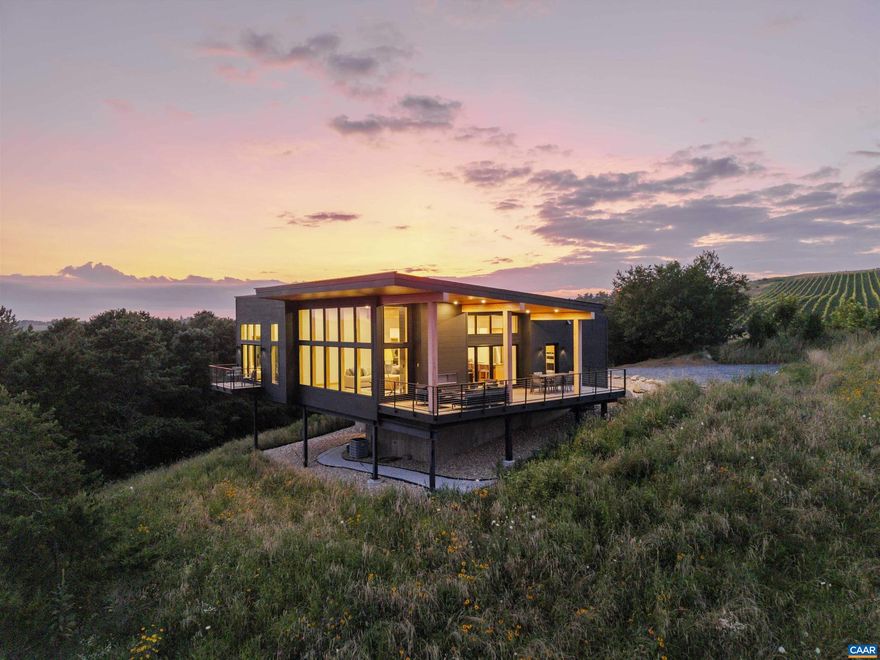 Perched high in Virginia?s Blue Ridge Mountains, this newly completed 3-bedroom, 3.5-bath home epitomizes modern mountain living with elegance and craftsmanship. Designed by acclaimed Bohlin-Cywinski-Jackson architects and furnished by Restoration Hardware, the home exudes timeless sophistication. It boasts 270-degree views, capturing the surrounding ridgelines in every direction. Awaken to breathtaking vistas over Virginia?s highest-altitude vineyard, and unwind on the expansive deck with a glass of wine sourced just feet away. Inside, soaring ceilings and floor-to-ceiling windows flood the interior with natural light, creating a seamless connection to the outdoors. Every detail has been carefully considered?from the temperature-controlled wine room and white oak floors to top-tier appliances. The terrace level includes a stylish studio apartment with its own bedroom and full bath, offering a comfortable and private space for guests. Just a stone?s throw from the Blue Ridge Parkway, this home offers tranquil seclusion with excellent access?less than an hour from Charlottesville, and 40 minutes from Staunton or Lexington. Discover a luxurious mountain lifestyle where architectural excellence meets the raw beauty of the Blue Ridge.,Exterior Fireplace,Fireplace in Great Room