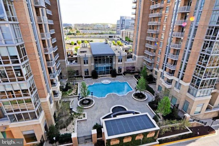 Make your home above Reston Town Center in the 21-story Luxurious Midtown, internationally recognized as a stunning example of urban living. Combine the signature qualities of a five-star hotel with the intimacy of a private retreat.This unique and very open luxury floor plan has the exceptional view of Reston Town Center, city escapes! Compare ..you ll recognize the difference.