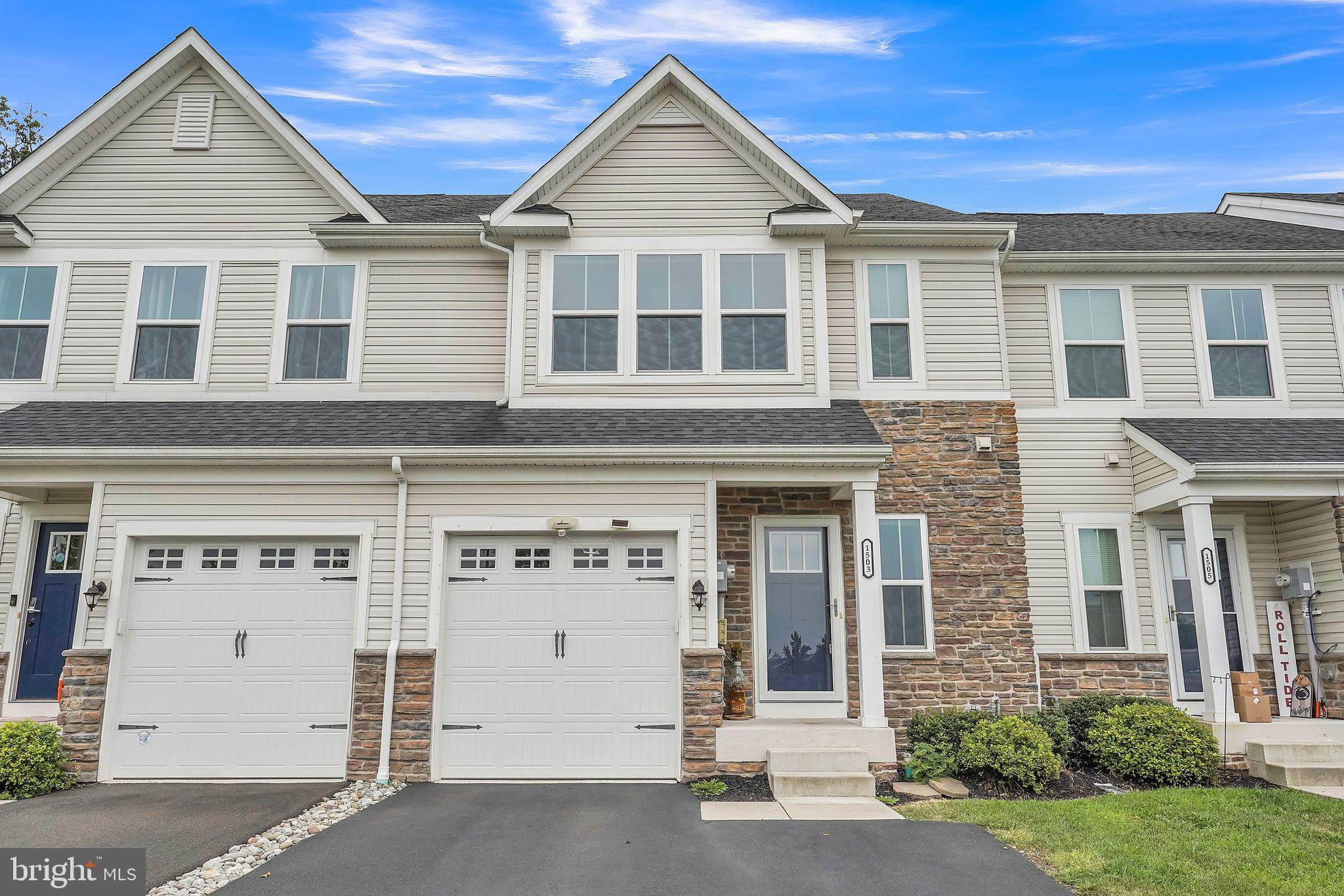 *** OPEN HOUSE Saturday, August 16th 12:00 PM - 2:00 PM *** Are you in the market for a new home that is both modern and spacious? Look no further than this stunning like new construction townhouse located at 1503 Emily Ct in Hatfield.
This beautiful largest model townhouse boasts 3 bedrooms, 3.5 bathrooms, and 2524 square feet of living space with fully finished basement/bonus room. The open floor plan and hardwood flooring throughout entire main floor give this home a sleek and contemporary feel, perfect for those who appreciate a modern aesthetic.
With a 1 car attached garage, 2 off-street parking spots in a private driveway, and double-paned windows, convenience and energy-efficiency are top priorities in this home. Not to mention, it is located in the highly desired North Penn School District and close to highways, making it the ideal location for families on the go.
The kitchen is a chef's dream, with new stainless steel appliances, granite counters, and a large kitchen island. Natural light floods the room, creating a warm and inviting atmosphere for cooking and entertaining.
The bathrooms are equally as impressive, with a walk-in shower, tile floors, and a dual vanity. Each room features hardwood floors and large windows, adding to the overall charm and character of the home.
Step outside onto the large Trex deck and take in the beautiful outdoor space that this home offers. Perfect for summer barbecues and relaxing evenings under the stars.
But that's not all - this home also features a fully finished basement, surround sound speakers, central vacuum system and a hook-up for an electric vehicle. With all of these amenities, this home truly has it all.
Don't miss out on the opportunity to make this townhouse your new home sweet home. Contact us today to schedule a showing and see for yourself all that this property has to offer.