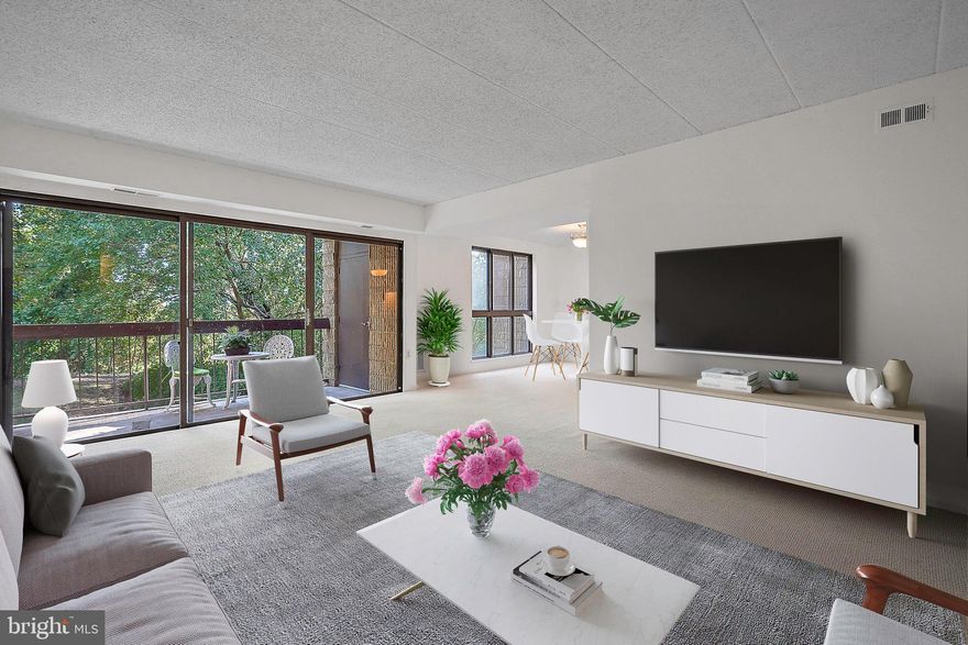 Welcome to 5160 Maris Avenue! This bright, spacious, and beautifully refreshed 2-bedroom, 2-bathroom condo offers 1,238 square feet of comfortable living space. The open floor plan connects the living and dining areas, creating a warm and welcoming space perfect for everyday life or hosting friends and family. A sizable balcony is the perfect respite to sip your morning coffee or read a book with a view that looks into the woods, making it feel like you're in a park.

The entire condo has been freshly painted from top to bottom and features brand-new carpet and updated flooring that bring a fresh, move-in-ready feel. The kitchen offers great flow and functionality, great as-is or could easily be modernized. Both bedrooms are generously sized with plenty of closet space, and the primary suite features a full en-suite bathroom. A second full bath adds flexibility for guests or family members. While both bathrooms are in fine working order, they offer a great opportunity for future updates that will add value over time.

If you're a commuter, you'll love your very own covered parking spot (#52), along with additional parking for the community. There's easy access to public transportation, major commuter routes, and the nearby Metro — perfect for anyone working in or around Washington, DC. Just minutes away, you’ll find a variety of restaurants, shops, and everyday amenities, giving you the ideal balance of accessibility and convenience. *There is one small flight of stairs to the second floor. 

Located in a well-maintained community, this condo is the perfect blend of privacy, practicality and timeless charm. Whether you’re a first-time buyer, downsizing, or looking for a smart investment, this property delivers the space, the potential, and LOCATION that make Alexandria living truly exceptional.

Don’t miss the chance to make 5601 Maris Ave #201 your next home sweet home!

OPEN HOUSE - SATURDAY, OCTOBER 25th from 11am-1pm. Come by and have a look at this spacious property with lots of natural light in a great location. Feels like a private oasis!
