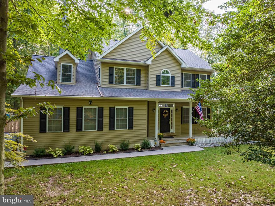 Nestled amongst beautiful mature trees, this classic Colonial offers a private setting, yet close to all the areas amenities and attractions. All the heavy lifting has been done including a New Roof with a 50 Year Transferrable Warranty, Surgical Stainless Steel Gutter Guards, which on a wooded lot is worth its weight in gold. New Dual Zone HVAC warranted until 2027, New 70 Gal Hot Water Heater, New Washer and Dryer, New Stainless Appliances, Fresh paint. Fresh stone in driveway. This property is ready for YOU !! Inside this beauty you will find solid Oak Hardwood in the Dr, Kitchen and Breakfast Nook, Gas Fireplace and a Wood Burning Stove, Sunken Living Room, Separate Dining Room, Two Car Garage, Formal Living Room, Wood Decking overlooking the private shaded yard, Finished extra bonus room above the garage. All this on a wonderful wooded one acre setting in The Land of Pleasant Living !!