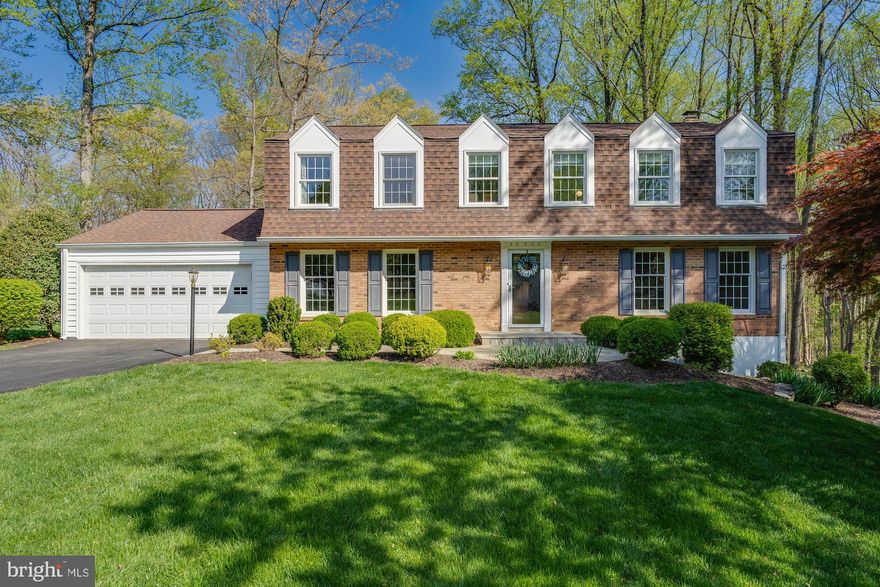 Gorgeous colonial home in the highly desirable Oak Hill community. This home features 5 bedrooms, 2.5 bathrooms, 3,520 square feet with its open concept plan allowing for natural light. 2 car garage and driveway with ample room for cars. Main level at its best with a layout that allows for great flow from room to room that features crown molding, chair railing, recessed lighting, and hardwood flooring. Welcoming foyer that leads to formal living room, dining room, and family room with a fireplace. Gourmet kitchen with stainless steel appliances, granite countertops, custom tiled backsplash, and center island with bar seating. Upper level owner's suite features a large walk-in closet with a vanity, spa-like en suite bathroom with walk-in shower. Four additional bedrooms and full bathroom on the upper level. Lower level features a finished basement with tons of potential, an office, and storage space. Outdoor living with an expansive deck and screened-in porch with skylights. Quiet .48 acre lot backs to trees for privacy, great for entertaining friends and family. Short drive to shops, restaurants, Fair Oaks Mall, VA-665, and Fairfax County Parkway. Nearby Crossfield, Carson, and Oakton Pyramid.