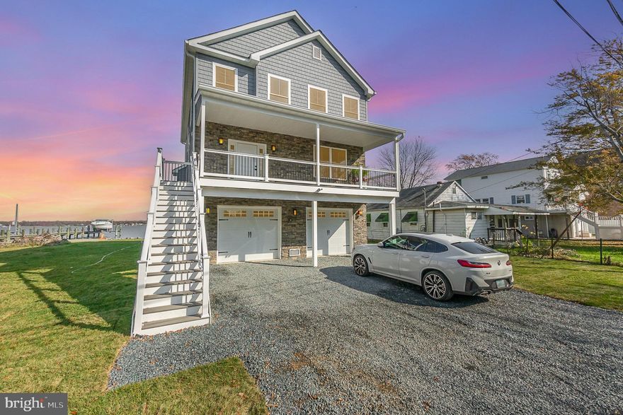 Every once in a while opportunity for you to own a stunning coastal retreat nestled along the picturesque shores of the Back River and Chesapeake Bay in Baltimore County. This brand-new, waterfront offers luxury living combined with breathtaking panoramic views that will leave you in awe. This Coastal Style home boasts 3/4 bedrooms and 3 full baths, meticulously designed to harmonize with its natural surroundings while providing unparalleled comfort. From the moment you step inside, you'll be greeted by an ambiance of coastal charm, high ceilings, expansive views, and premium finishes throughout.
Wake up to the gentle sound of waves and indulge in the mesmerizing beauty of sunrise over the water. In the evenings, unwind with loved ones as you witness the captivating sunset painting the sky with a kaleidoscope of colors. Convenience meets tranquility with this prime location just minutes off the Baltimore Beltway, offering easy access to city amenities while still providing a serene escape from the hustle and bustle of urban life. Whether you're seeking a full-time residence or a weekend getaway, this home is perfectly situated to cater to your every need. Included in the sale is a 70-foot pier, extending your waterfront experience with direct access to the Back River and Chesapeake Bay. Imagine spending your days fishing, boating, paddle boarding, kayaking or simply basking in the sun while taking in the panoramic vistas that surround you. Additionally, the sale encompasses two lots across the lane from the property, providing ample space for potential future expansion, outdoor entertaining, or creating your own personal oasis. Don't miss out on this rare opportunity to own a slice of the Buzzing Baltimore County Waterfront.  Schedule your private viewing today and make your dream of owning a waterfront retreat a reality!