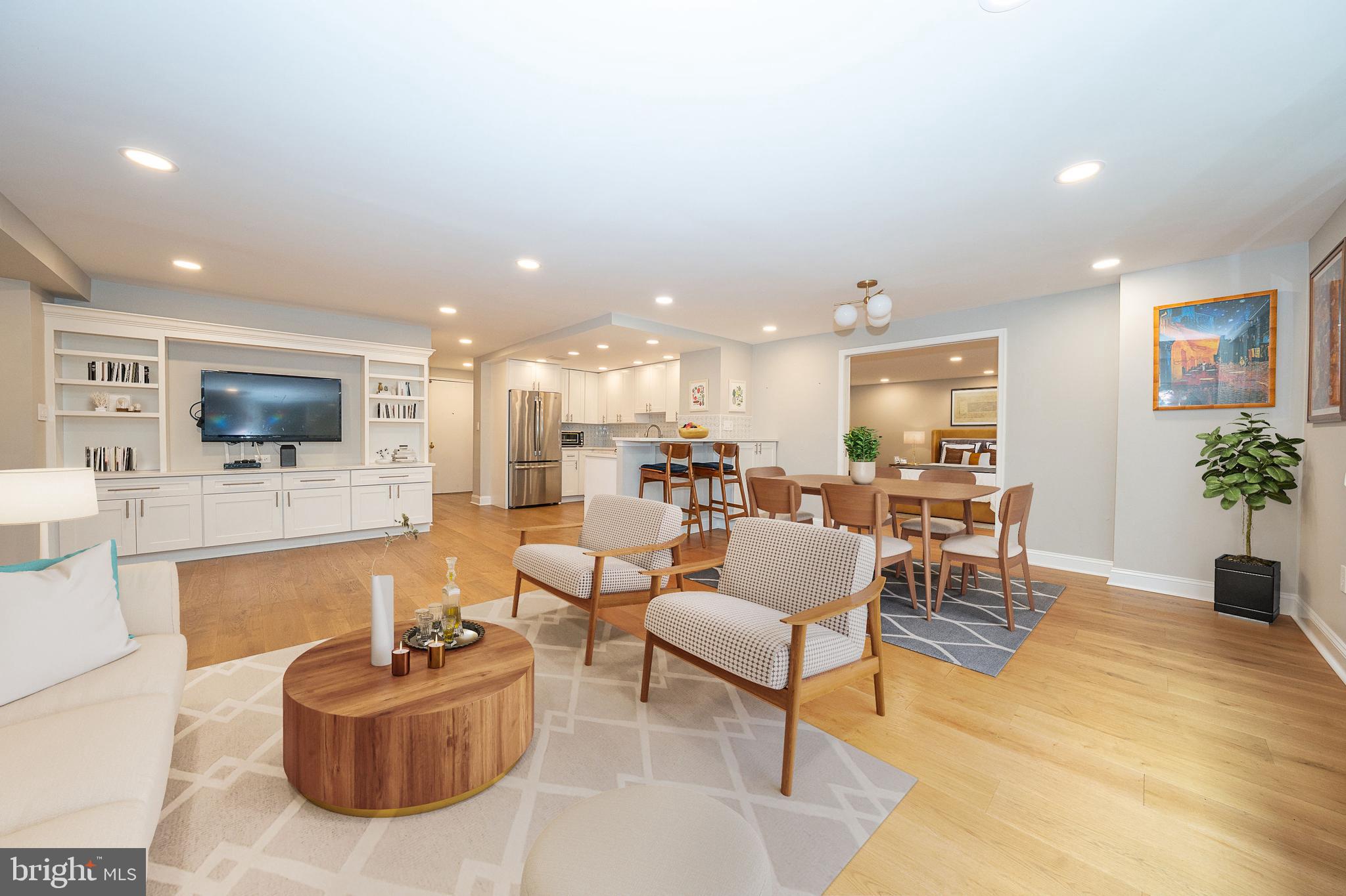 Don't miss this fabulous, completely renovated, 3-bedroom, 2-bathroom, 1581 sq ft combined unit on the North side of the William Penn House in desirable Rittenhouse Square. As you step inside, you will be greeted with a spacious living room and hardwood floors, recessed lighting, and designer window treatments throughout the home. The open concept design seamlessly connects the living room to the dining area and kitchen, creating a cohesive living space perfect for your lifestyle. The kitchen has been completely renovated, including new cabinets, quartz countertops, high-end stainless-steel appliances, a custom pantry, and a convenient breakfast bar. The spacious primary bedroom has a walk-in closet and an updated full ensuite bathroom. Two additional bedrooms offering plenty of natural light, ample closet space, and an updated full hall bathroom complete this unit. This condo has been thoughtfully designed with the modern homeowner in mind, offering premium amenities including a custom mudroom, custom built-in cabinetry, outfitted closets, and in-suite laundry. You will appreciate the attention to detail in every aspect of this modern, turn-key home. This building features 24-hour Security and Doorman, On-Site Management and Maintenance, and a Rooftop Pool with amazing city views. On-premise VALET Parking available for $110 per month for one car. THE MONTHLY FEE INCLUDES ALMOST EVERYTHING: All Utilities including electric, heat, air conditioning, water & basic cable, All Real Estate Taxes & Maintenance Package. This unit has an abundance of closet space & newer windows. This spectacular building has NEVER HAD AN ASSESSMENT! Nominal real estate transfer tax & no title insurance required. Experience the ability to walk out your door to first-class, 4-star restaurants, fabulous shopping & all the conveniences of this sought-after neighborhood. Walk score is a 98! One-time admin fee paid at closing.