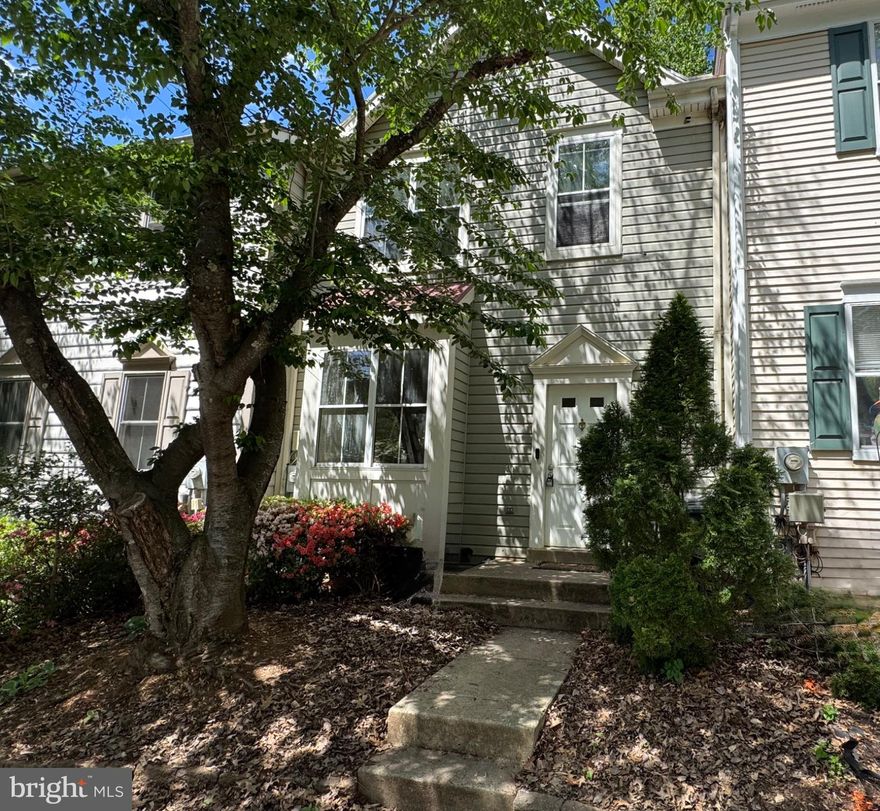 Nestled in the charming Churchill Town Sector, this delightful Colonial townhouse offers a perfect blend of comfort and modern living. With 1,630 sq. ft. of thoughtfully designed space, the open floor plan invites warmth and connection. The gourmet kitchen, featuring upgraded countertops and stainless steel appliances, is perfect for culinary enthusiasts. Enjoy meals in the cozy breakfast area or host dinner parties in the dining space.  The home boasts two full and two half baths, ensuring convenience for all. A fully finished basement with a walkout level provides additional living space, ideal for relaxation or entertainment. Step outside to discover extensive hardscaping and stone retaining walls, creating a serene outdoor retreat. The community amenities include a refreshing outdoor pool, jogging paths, and a picturesque lake, perfect for leisurely strolls or picnics. Located within a vibrant neighborhood, residents benefit from nearby parks, excellent schools, and convenient public services. Assigned parking ensures ease of access, while the community's commitment to maintenance and snow removal adds to the overall appeal. With its inviting atmosphere and proximity to nature, this home is not just a place to live, but a place to thrive. Experience the joy of community living in this beautiful townhouse, where every detail is designed for comfort and connection.