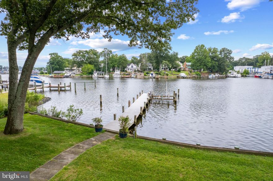 Presenting extraordinary Cypress Creek views, this waterfront rancher in the highly coveted Severna Park community of Cape McKinsey was perfectly planned to highlight its stunning location. Presenting extraordinary views, with 114’ of water frontage, the residence was created for gracious living and waterfront entertaining.  This three bedroom, two full bath, 2 car garage home has been meticulously designed to exhibit an impeccable flow and seamless blending of indoor and outdoor spaces.  Enjoy the open floor plan, with generously proportioned living spaces that artfully lead your eye to the water.  Notable features include a gorgeous Great room with gas fireplace and dining room, both with water views and glass sliders to the waterside deck.  A new design-inspired kitchen (2021) boasts gleaming quartz countertops, quartz island with seating, stainless steel appliances and ample cabinetry.  Enjoy three spacious bedrooms with generous closets, including a waterside primary retreat with serene ensuite bath and sliders that lead to the waterside deck. The generous 1951 sq ft unfinished walkout basement with 8’ ceilings and water views is brimming with possibilities.  The picturesque waterfront grounds are perfect for entertaining and leisure, from the inviting screened-in porch and expansive waterside Trex deck to the exquisite hardscaping and meticulous landscaping.   Follow the perfectly manicured grounds to the water’s edge with approximately 114’ of water frontage with bulkhead to the deep-water pier (9+’ MLW) complete with 8,000 pound lift and electric service. Celebrating beauty and privacy at a one-of-a-kind waterfront location, this exquisite residence offers easy access to the amenities and lifestyle of the Magothy River.
