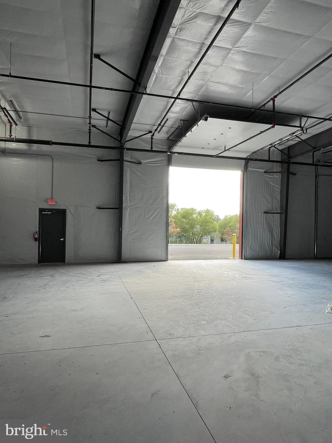 PRICE ESTIMATE for Cold Dark Shell - 331 Aviation Way is a Sprinklered Condominium Building with PRICE ESTIMATE for Cold Dark Shell - 331 Aviation Way is a Condominium Building with 55,002 SF.           Unit 3 (5,652 SF); Unit 4 (5,172 SF), Unit 5 (5,781 SF), Unit 6 (5,652 SF), are Available for Sale ($200 PSF.) or Lease (at $13 SF).  
The Site totals 4.66 Acres and is Zoned M1 (Light Industrial) and located in the (AO) Airport Overlay Zone.  Located Across from Frederick Airport.