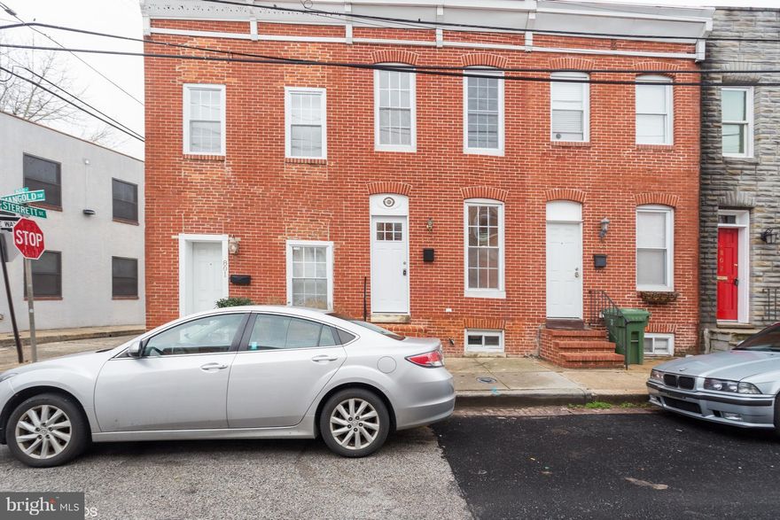 Newly renovated brick rowhome in an excellent commuter location. Enjoy nice room sizes with fresh paints, wood floors on main level, new carpets on upper level, eat in kitchen with stainless steel appliances and fully finished basement. The rear deck is perfect for warm weather outdoor living space. Move-in ready. Just minutes from Downtown Baltimore!