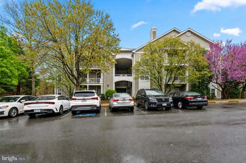 Photo of 1708 Lake Shore Crest Drive #24, RESTON, VA 20190 (MLS # VAFX2326438)