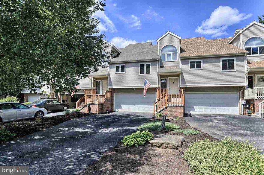Unique townhouse w/no dues Very lg upper&lower decks w/plenty of privacy, 8'x12'area of upper deck has canopy cover Most of home newly painted/newer kit/new carpet/lg LR w/vaulted ceiling+custom gas FP mantel Whole house Nutone sys/sec sys/central vac just mins to I-83 N&S & Rt 30 E&W Side by side refrig in gar incl No area of home is below grade Wallpaper in DR & border in DR/kit removed & areas painted Seller providing First Am Home warranty.