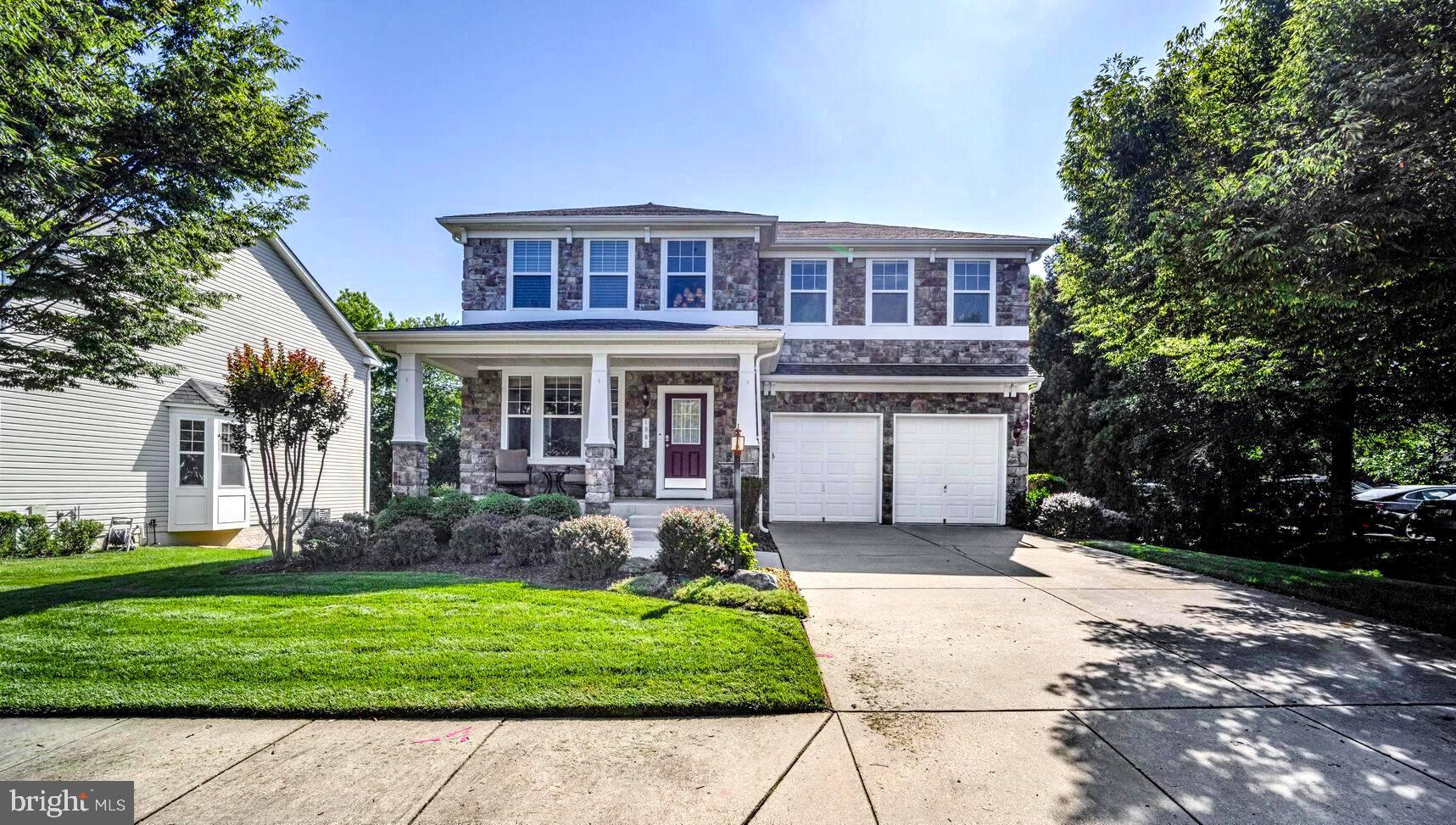 Welcome to this stunning 3 bedroom, 3.5 bath stone-front home situated on a large 9,289 sq .ft. corner lot in the sought-after Monticello community—just a short walk to shops and dining. The main level features an open living/dining area, gourmet kitchen with stainless appliances and granite counters, a spacious family room with gas fireplace that opens to a large screened-in porch, perfect for morning coffee or entertaining, a deck and private backyard. The upper level offers a large luxurious primary suite including a sitting area and ensuite bath with a soaking tub and large shower; two additional bedrooms; a full bath; and a versatile loft (ideal office or 4th bedroom). The fully finished lower level includes a large multi-use space, a wet bar, full bath, and ample storage. Enjoy the amenities of a community pool and dog park, and the convenience of nearby access to major commuting routes and downtown Annapolis.